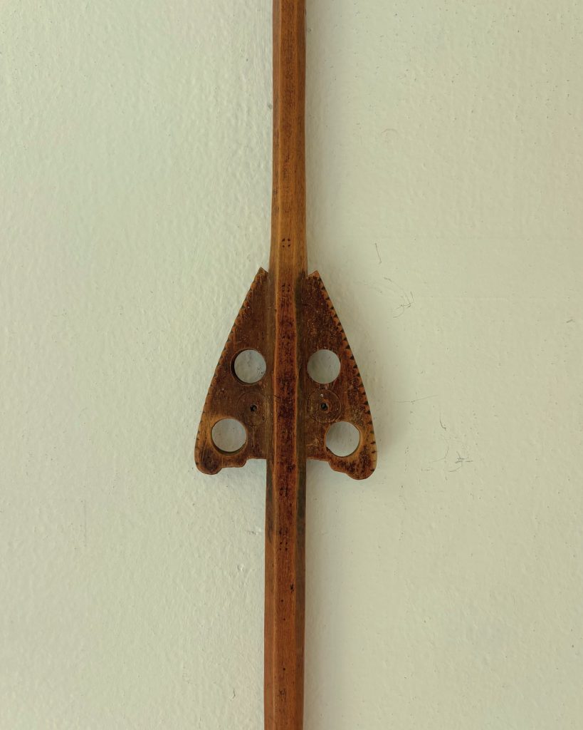 Simple spinning distaff with four circular perforations