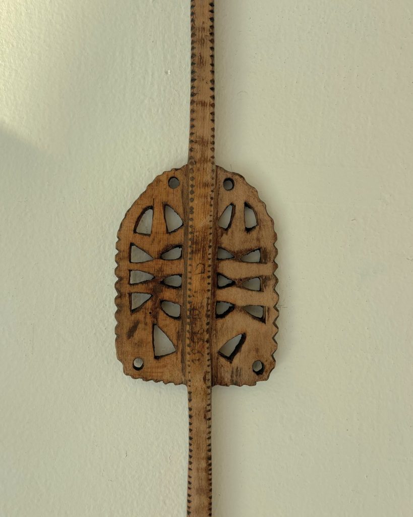 Spinning distaff with extensive openwork carving