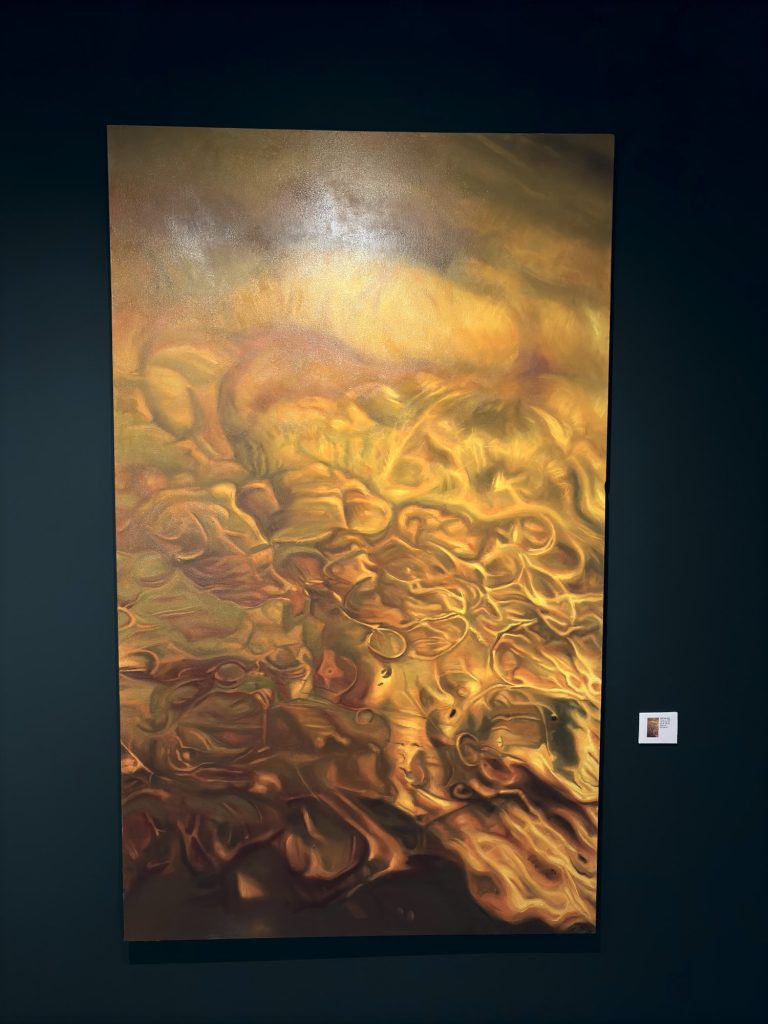 Large painting by Zoe Sua Kay in amber tones